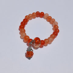 Bright Orange Glass Beaded Bracelet with Charm